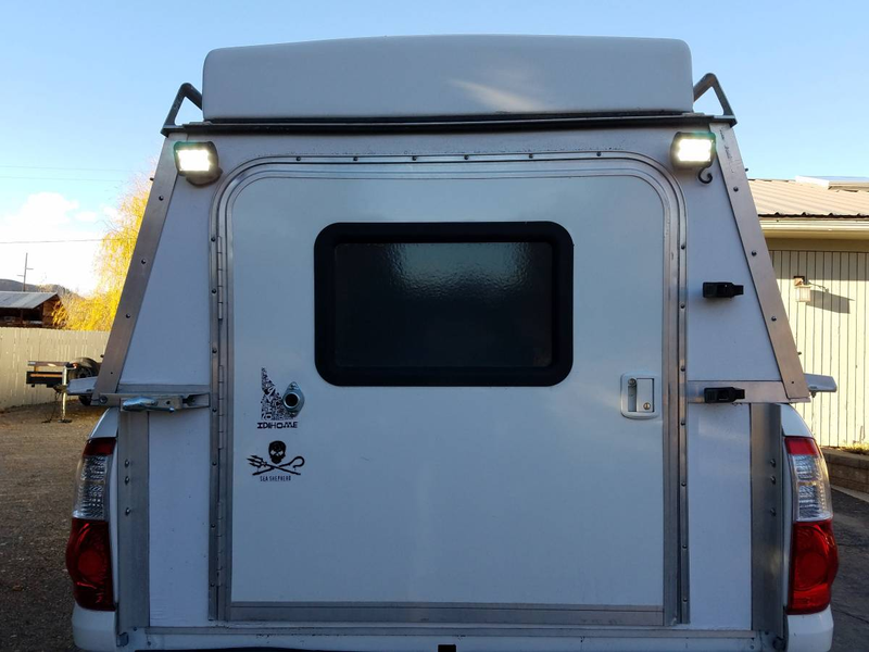 Illustration for article titled At $14,500, Could This 2004 Toyota Tundra TRD Camper Have You Saying Get Outta Town?